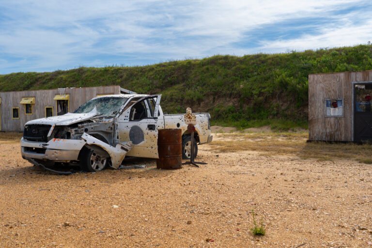 T1G Range 4 Hogan's Alley shot up pickup truck and steel headplate target